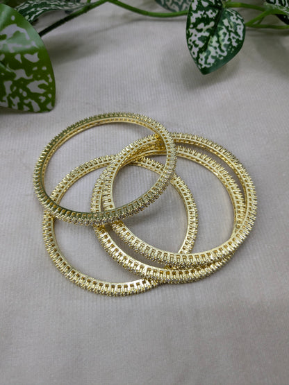 4 Piece Ad Golden Bangle Brass Metal Daily wear Set of Four Piece.